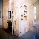 Warm and inviting travertine soothes the soul.